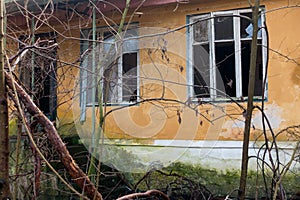 Exterior of an abandoned building broken windows