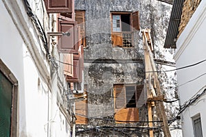 Exterior of an abandoned building in Street of Stone Town. Tanzania. Zanzibar Island.