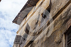 Exterior of an abandoned building in Street of Stone Town. Tanzania. Zanzibar Island.