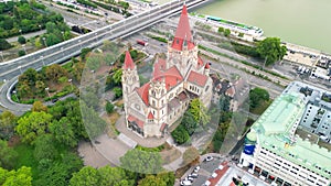 Exterior aerial view of Saint Francis of Assisi Church and Vienna cityscape, Austria