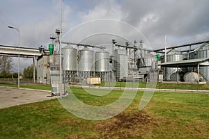 Exterior of Agricultural Silo building with storage tanks.