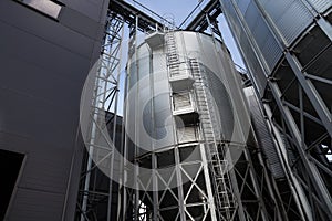 Exterior of Agricultural Silo building with storage tanks.