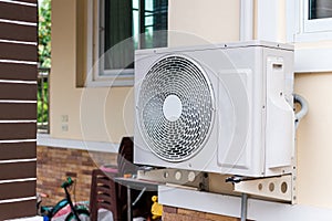 Exterior air conditioning unit on a wall