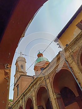 Exterior arcades with bell tower of San Bartolomeo and Gaetano church, Bologna ITALY