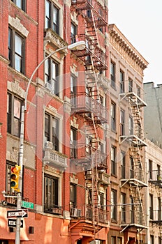 Exterior of a building with old fire escape in New York City