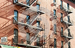 Exterior of a building with old fire escape in New York City