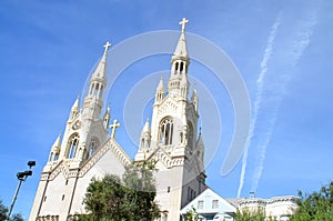 Exterior of church with steeples in San Francisco, California photo