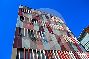 Exterior colorful of a modern office building in Milan, Italy