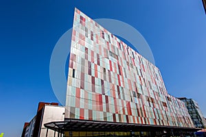 Exterior colorful of a modern office building in Milan, Italy