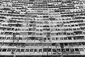 Exterior of crowded high rise residential building in Hong Kong city