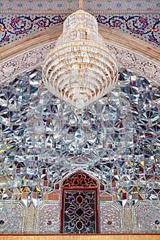 Exterior decoration of the entrance to the Shah Cheragh Mausoleum with mirror mosaics. Iran, Shiraz.