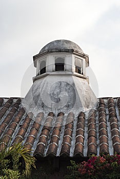 Exterior detail of house in La Antigua Guatemala, wall and cupula colonial style in Guatemala, Central America. photo