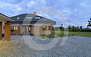 Exterior of an elegant modern house at night brick structure