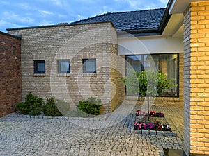 Exterior of an elegant modern house at night brick structure