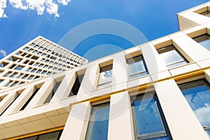 Exterior facade landmark view urban city scape photography foreshortening from below on blue sky