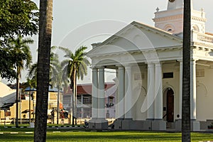 Exterior facade of an old colonial era church with gothic windows