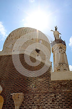 The exterior facade showing the dome and minaret of Abassi mosque in Rashid photo