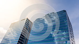 Exterior glass office building with sky and cloud