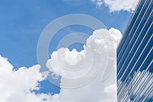 Exterior glass office building with sky and cloud