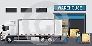 Exterior of an industrial warehouse with workers loading merchandise into a refrigerated container truck. Cargo and shipping