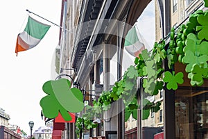 Exterior of irish pub decorated with shamrocks for St Patricks D