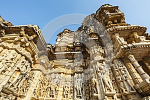 Exterior of the Jain temple Adinatha temple with scenes from the Kamasutra, in Ranakpur, Rajasthan, India