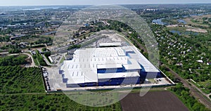 The exterior of a large modern production plant or factory, industrial exterior, modern production exterior