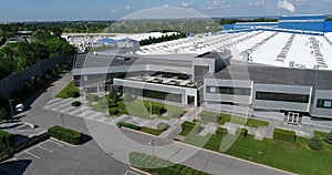 The exterior of a large modern production plant or factory, industrial exterior, modern production exterior