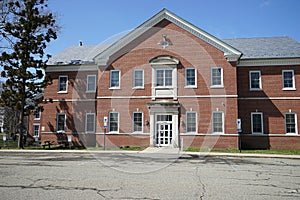 Exterior of a large red brick building