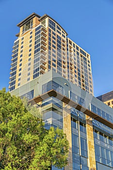 Exterior of luxury apartments in city residential area with blue sky background