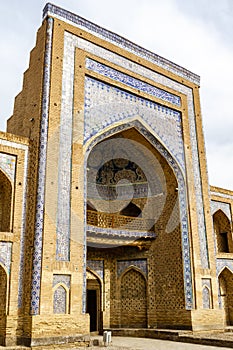 Exterior of a madrasa in Xiva, Uzbekistan, Asia photo