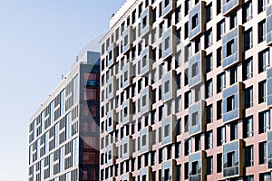 Exterior of modern architecture in the city center. Construction abstract background. Detail of the facade with windows