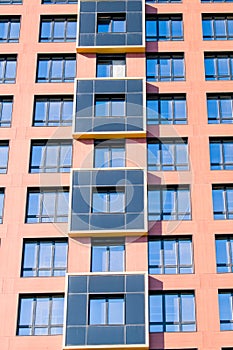 Exterior of modern architecture in the city center. Construction abstract background. Detail of the facade with windows