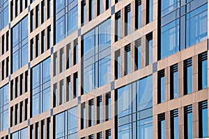 Exterior of modern architecture in the city center. Construction abstract background. Detail of the facade with windows