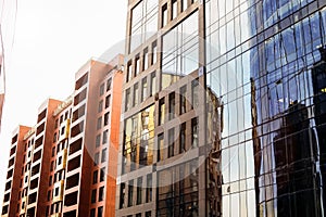 Exterior of a modern hotel with glass window. Contemporary apartment building with new design.