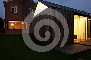 Exterior Of Modern House With Extension At Night