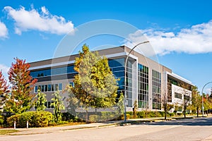 Exterior of a modern industrial building. Modern Business Building in Urban Street Setting