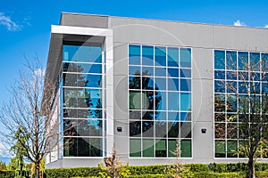Exterior of a modern industrial building. Modern Business Building in Urban Street Setting