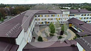 Exterior of a modern sports complex. Sports complex view from the drone. Modern sports complex.