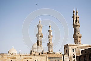 Exterior of a mosque in the old city part of cairo egypt. Decorated walls and minaret towers