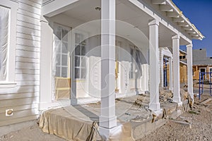 Exterior of new home with porch in Daybreak Utah