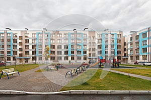 Exterior of new modern low-rise house building exterior mixed-use urban multi-family residential district area