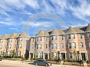 Exterior of new townhouse apartment building near Dallas under c