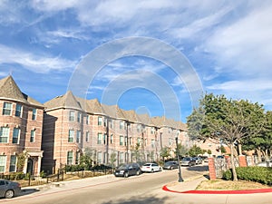 Exterior of new townhouse apartment building near Dallas under c