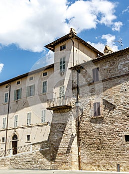 Exterior of an old building and city wall of Assisi, Umbria, Italy