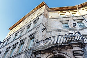 Exterior of an old city palace in the historical center of Perugia, Umbria, Italy