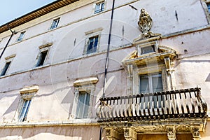 Exterior of Palazzo Vallemani city palace in Assisi, Umbria, Italy