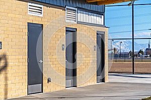 Exterior of the public restrooms at a park viewed on a sunny day