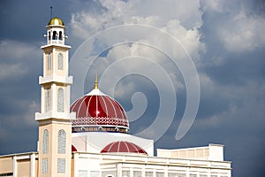 Exterior of red domed mosque photo