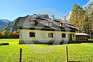 Exterior of rustic house in mountains photo